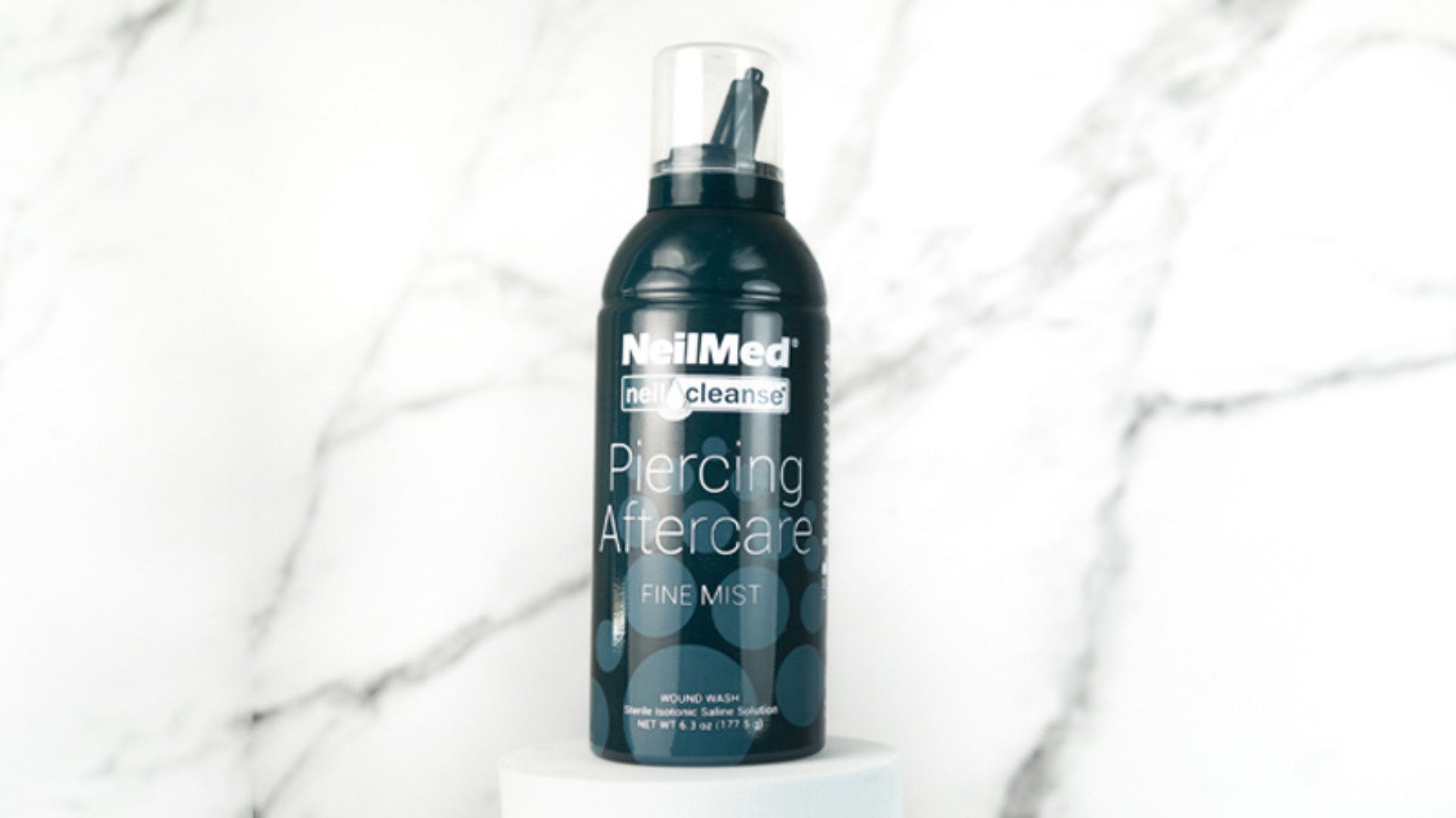 piercing saline solution spray