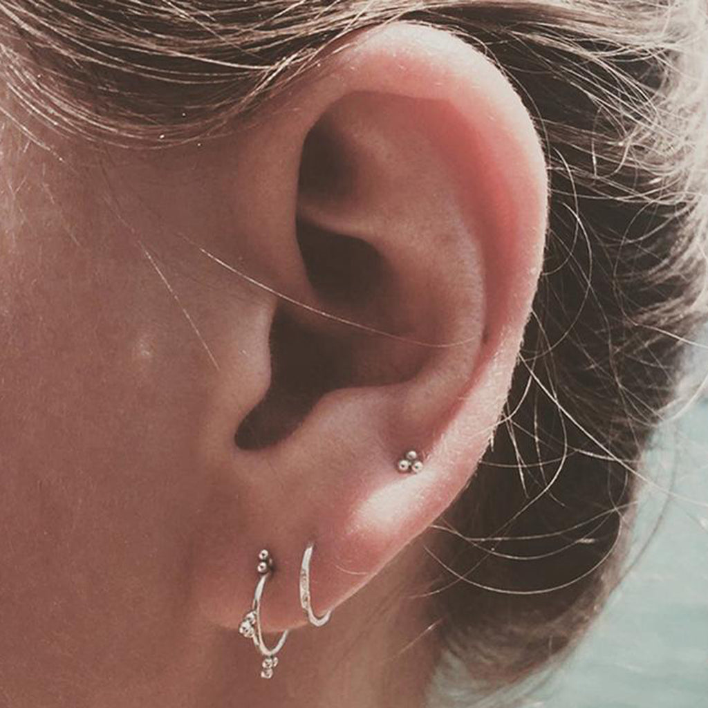 bohemian helix tragus daith piercing