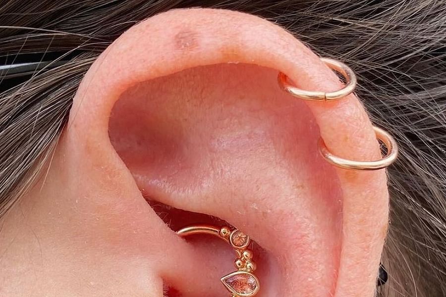 modern helix tragus daith piercing