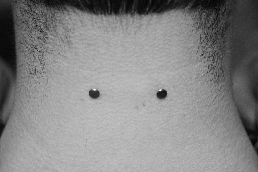 nape of the neck dermal piercing